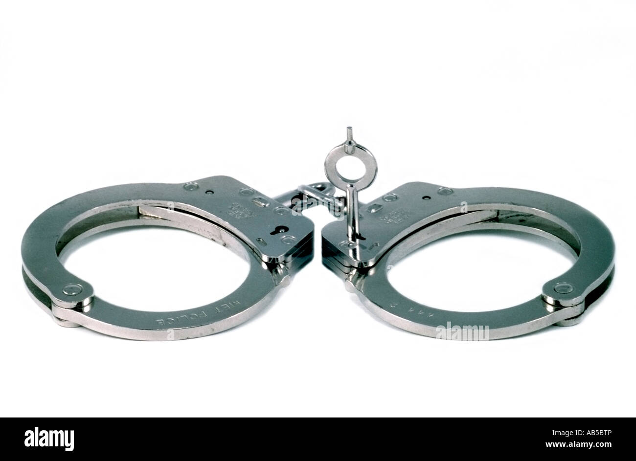 Close up of handcuffs and key Stock Photo Alamy