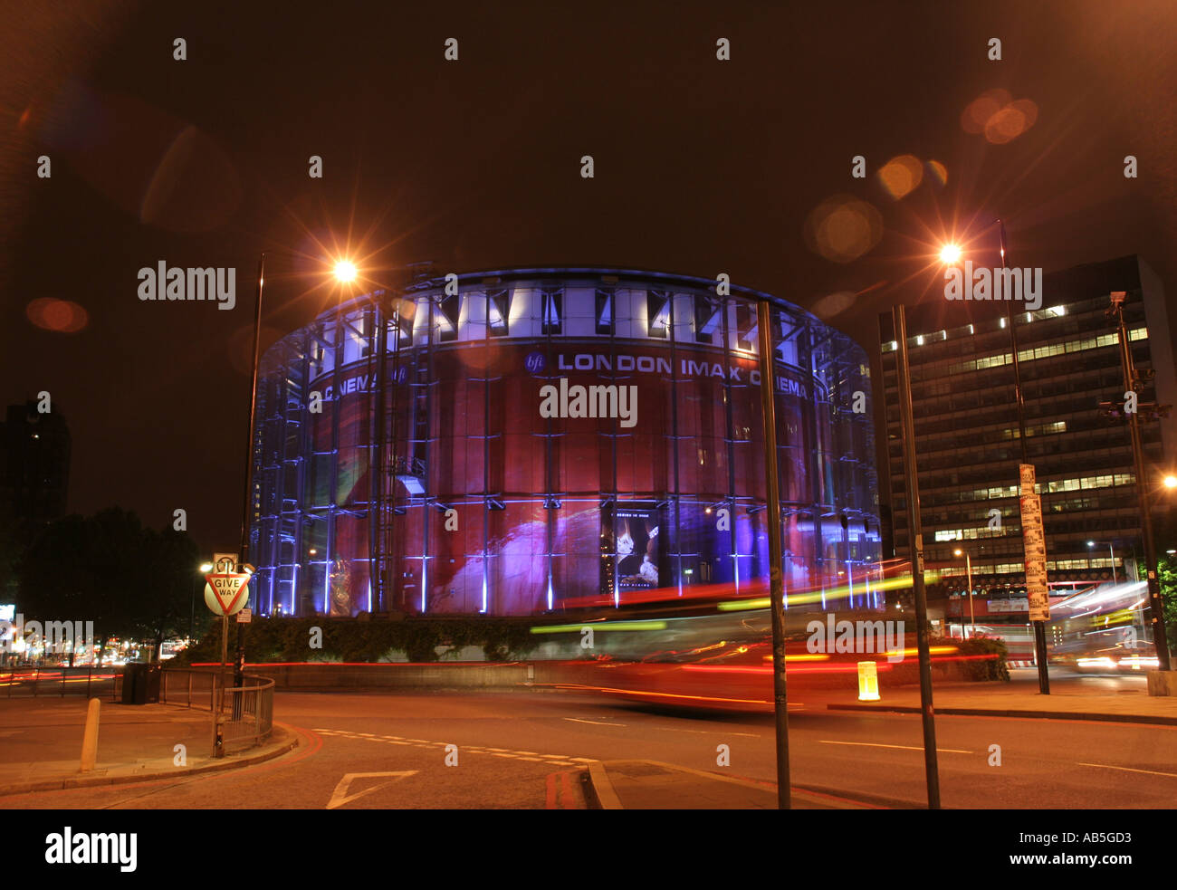 car lights rushing past the british film institute s imax cinema created using camera effect Stock Photo