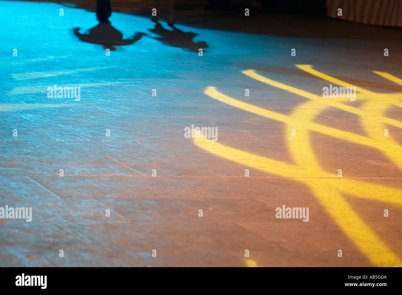 colourful lights floor and human shadows Stock Photo