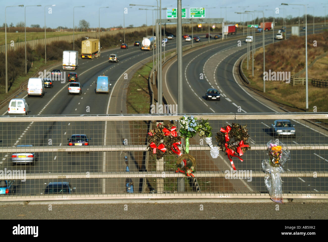Essex floral tributes placed on parapet railings of bridge above dual carriageway following a fatality Stock Photo
