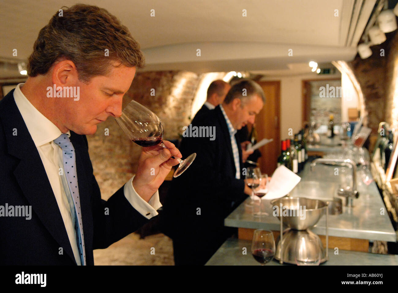 A wine tasting takes place. Stock Photo