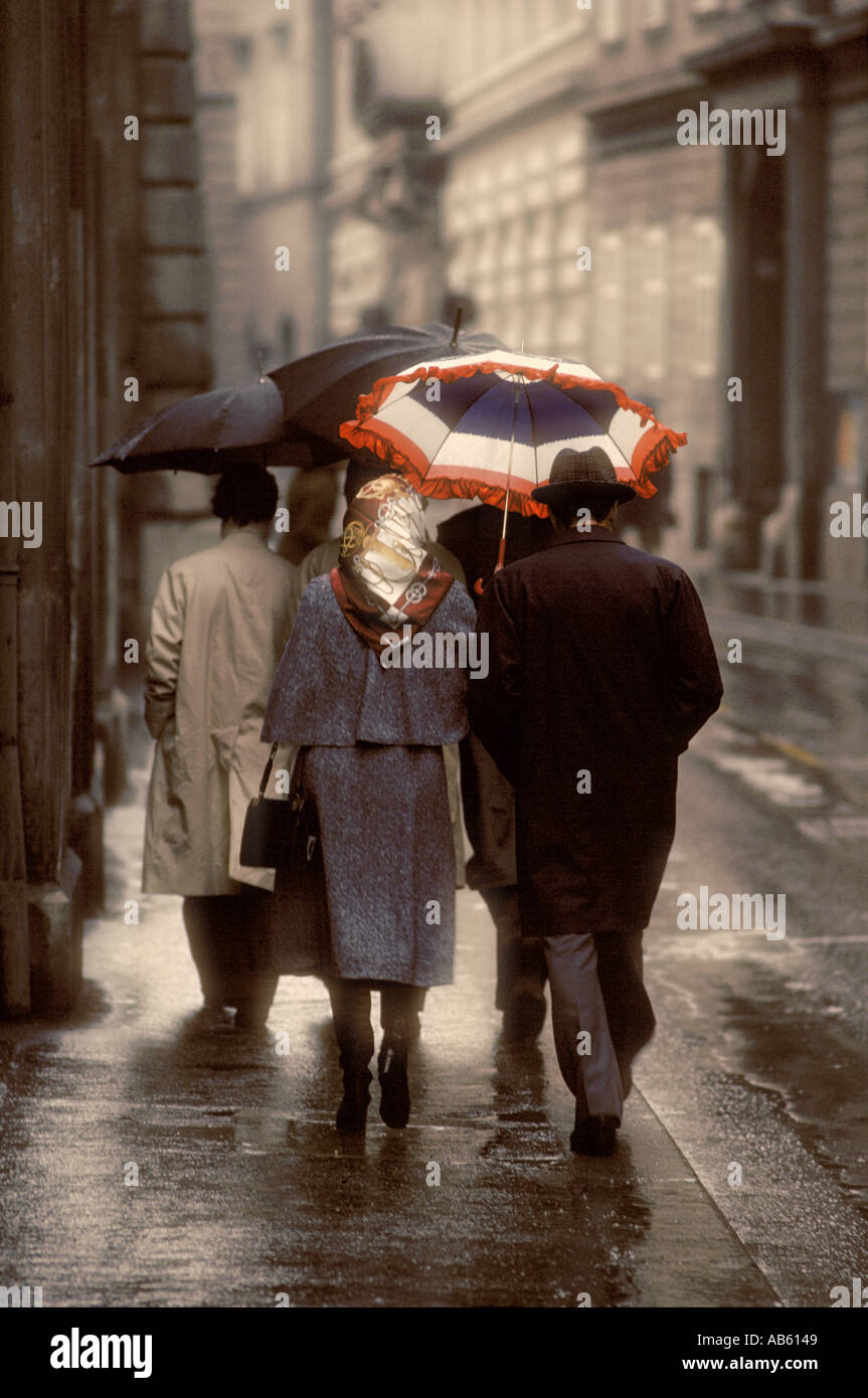 Pedestrian with red umbrella hi-res stock photography and images - Alamy