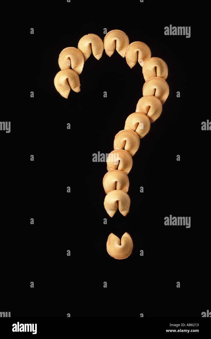 Fortune Cookie question mark on black background Stock Photo Alamy