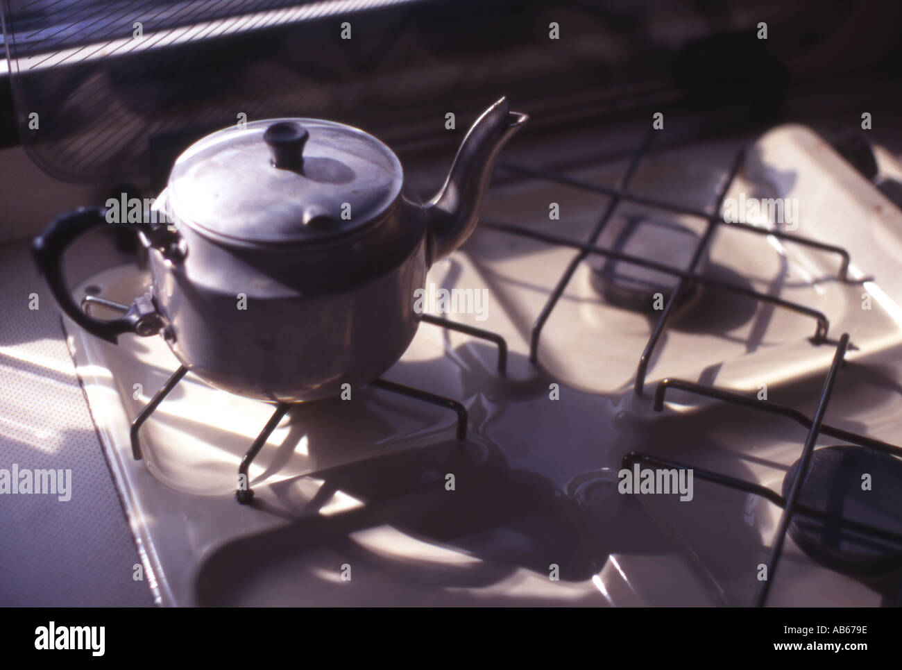 teapot on gas stove in caravan Stock Photo Alamy