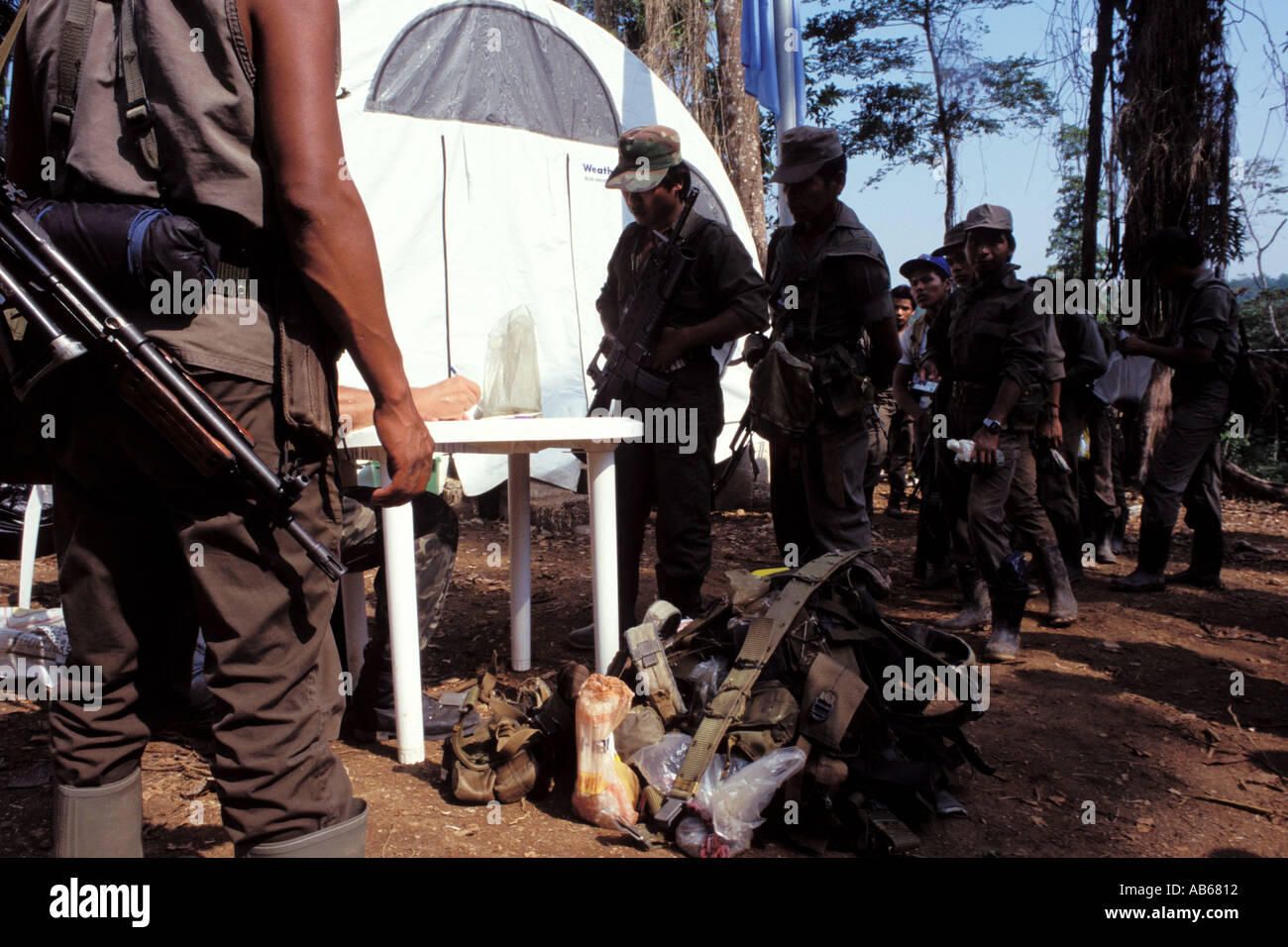 URNG guerrillas turning in their weapons as part of the peace accords signed in Guatemala in 1996 Stock Photo