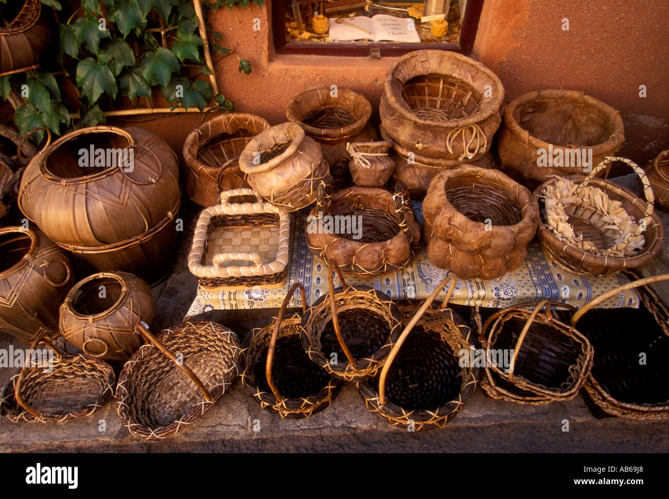wicker basket, wicker baskets, basketwork, basketry, crafts, street vendor,  village of Roussillon, Roussillon, Vaucluse, Provence, France, Europe Stock  Photo - Alamy