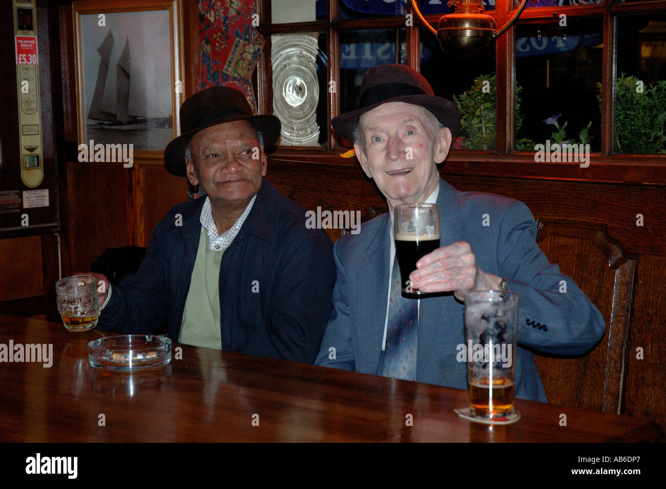 Older men in pub drinking Stock Photo