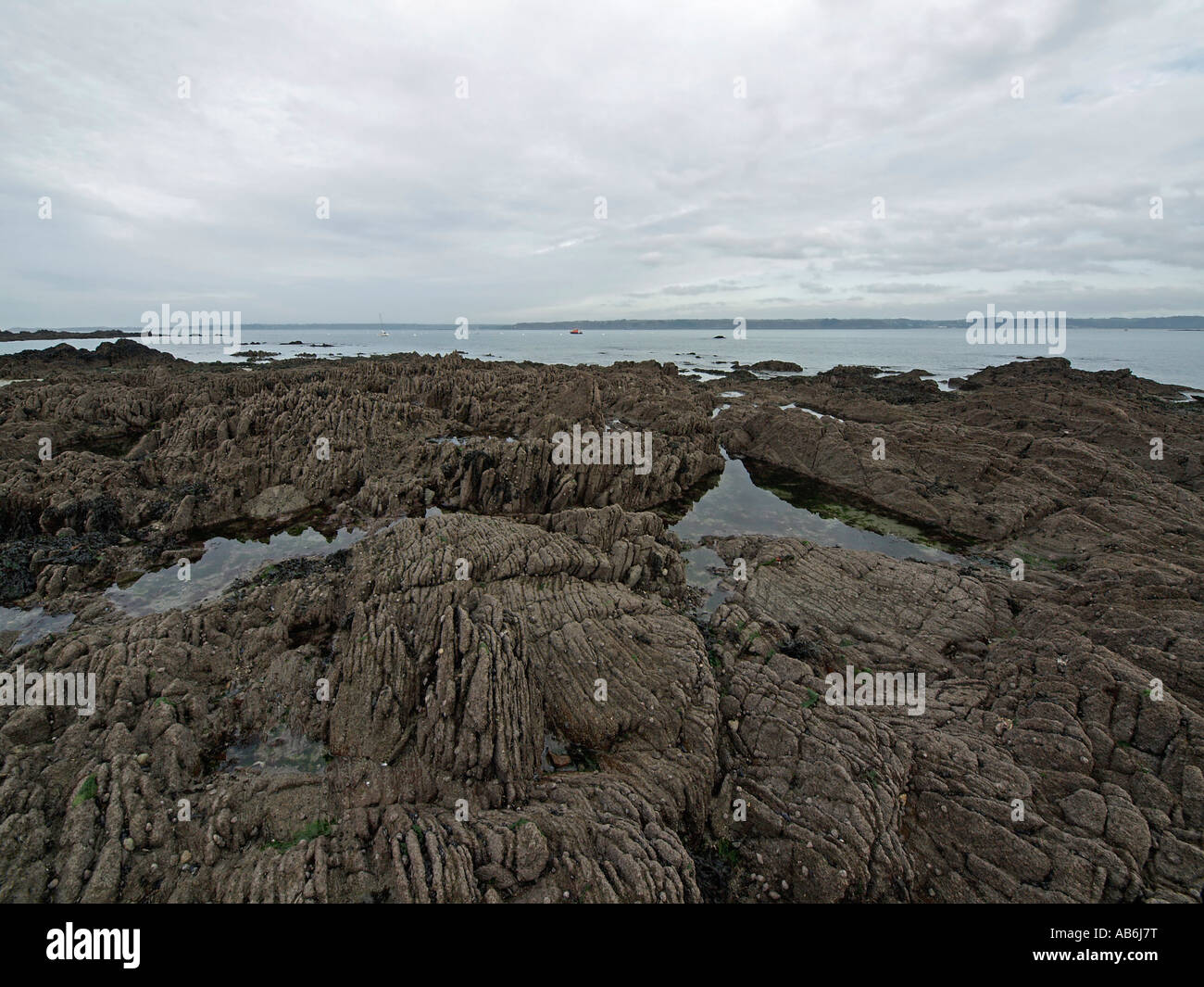 landscape stony strand at the coast in Locquirec in Finistere Brittany ...