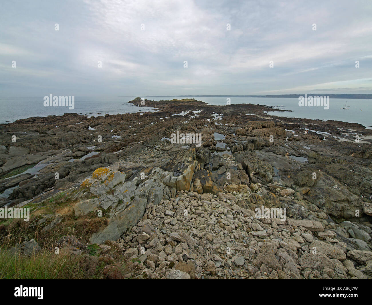 landscape stony strand at the coast in Locquirec in Finistere Brittany ...