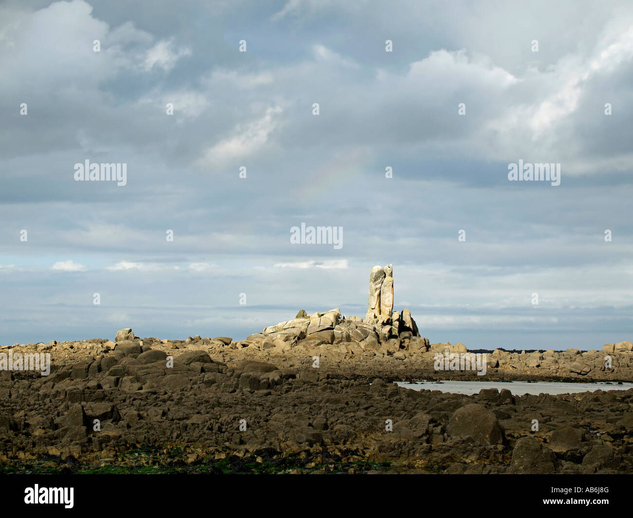 low tide stony strand with granit rocks at the coast near by Kerlouan ...