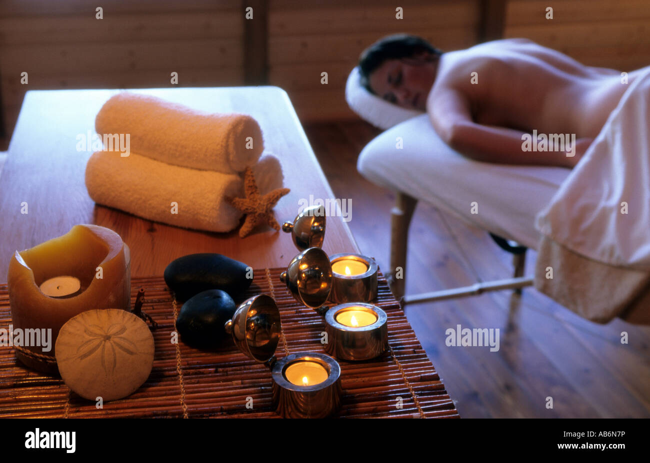 Woman in spa massage candles aroma therapy at Clayoquot Wilderness Resort, Canada North America Stock Photo