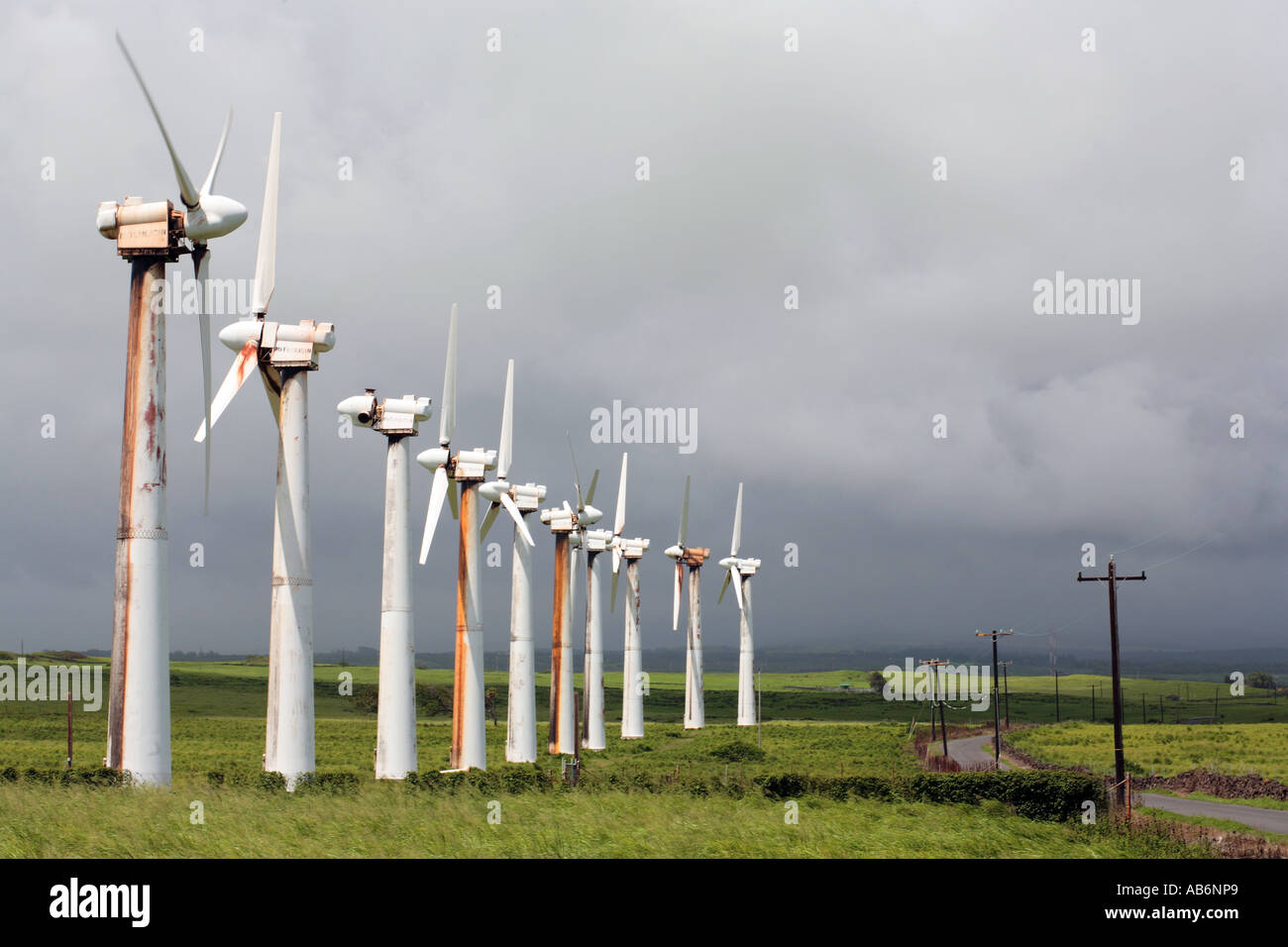 Old electric wind generators near southernmost tip of Big Island in Hawaii Stock Photo