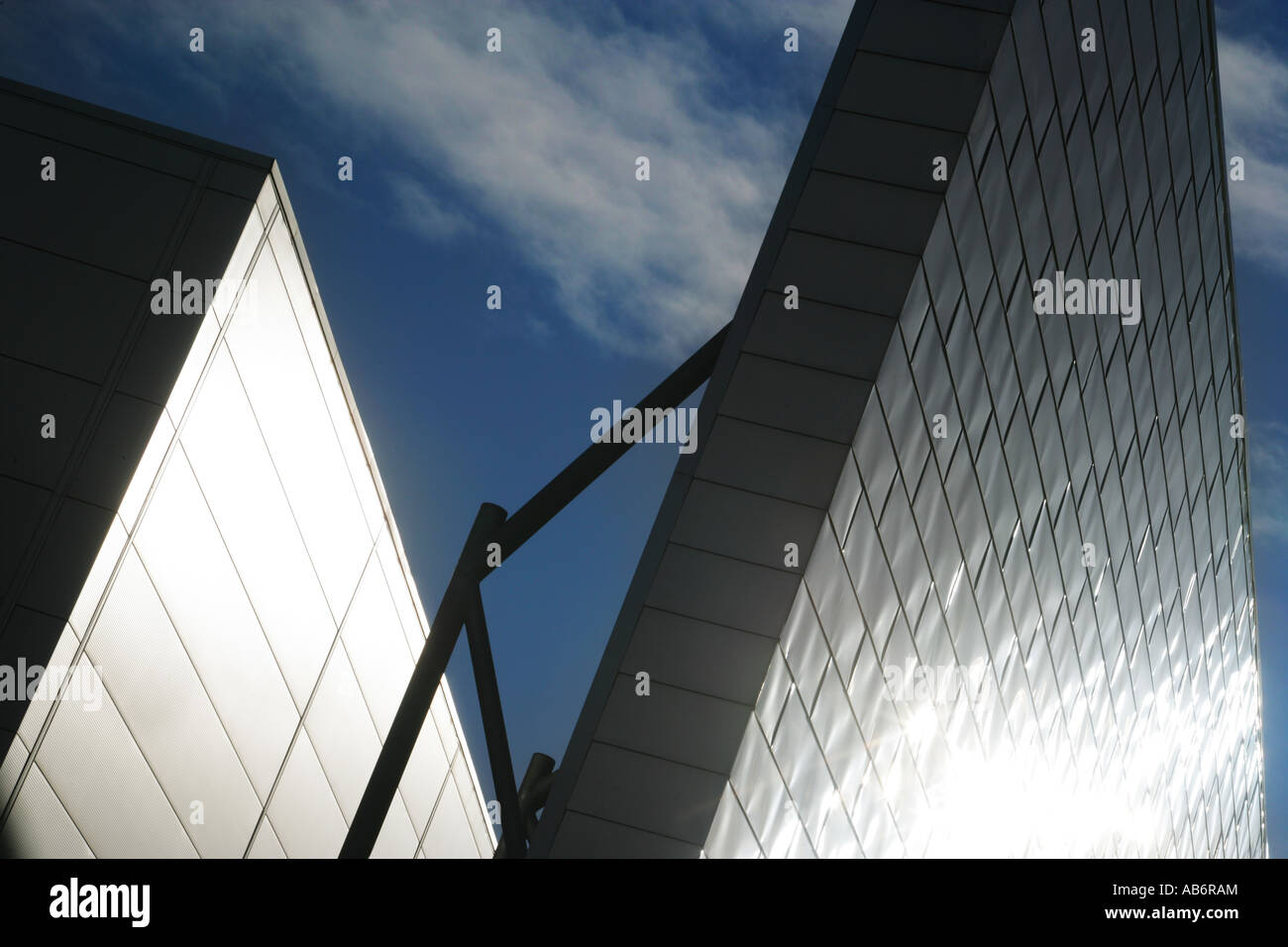 aluminum wall with supports against sky and building Stock Photo
