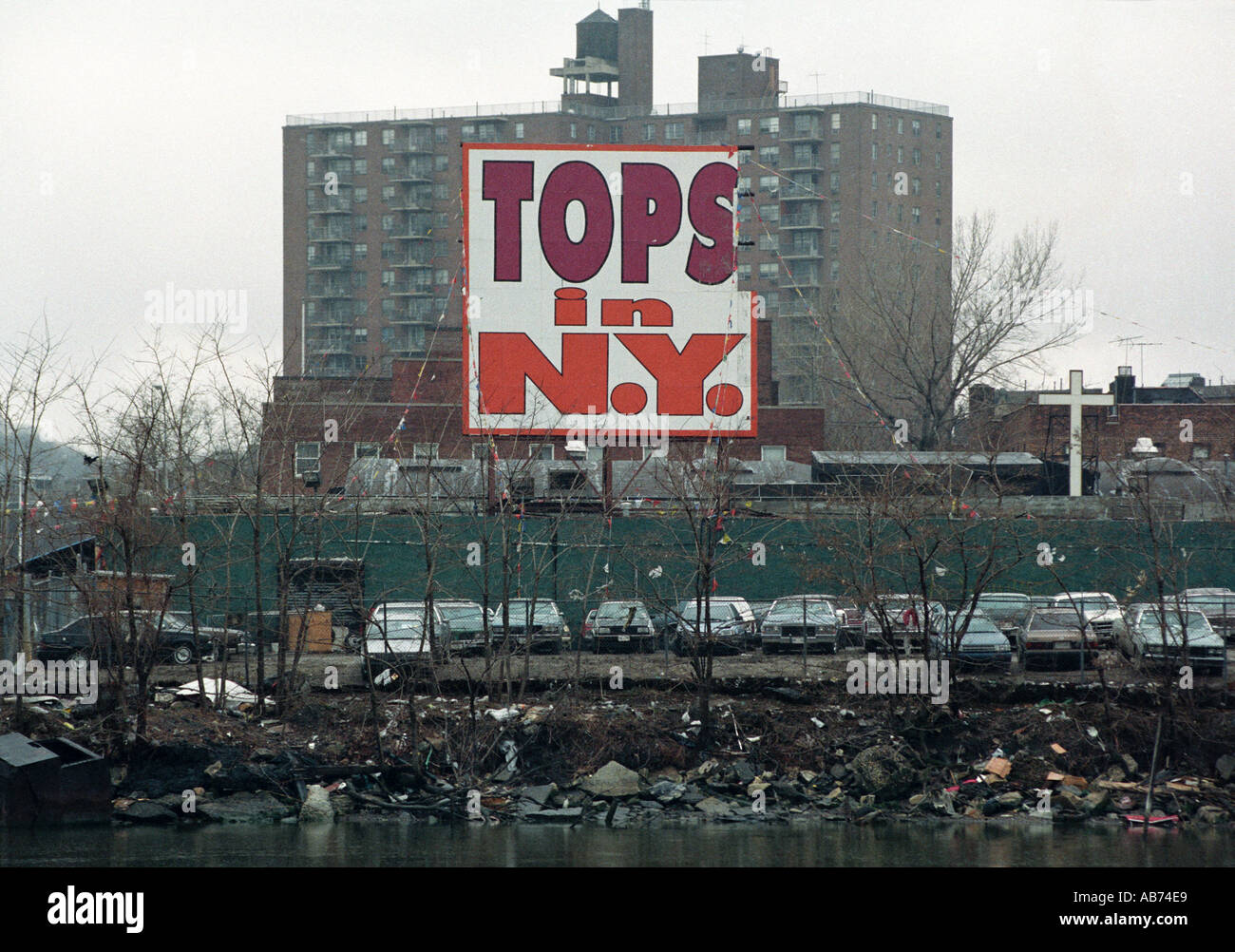 New York USA 1993 A huge billboard adverising a car lot Stock Photo Alamy