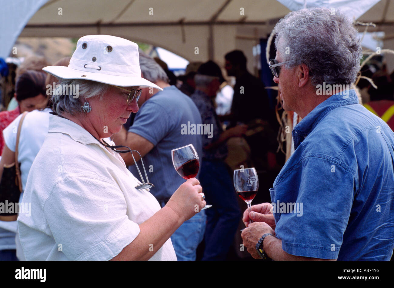 Wine Tasters tasting Red Wine at Festival of the Grape, Oliver, BC