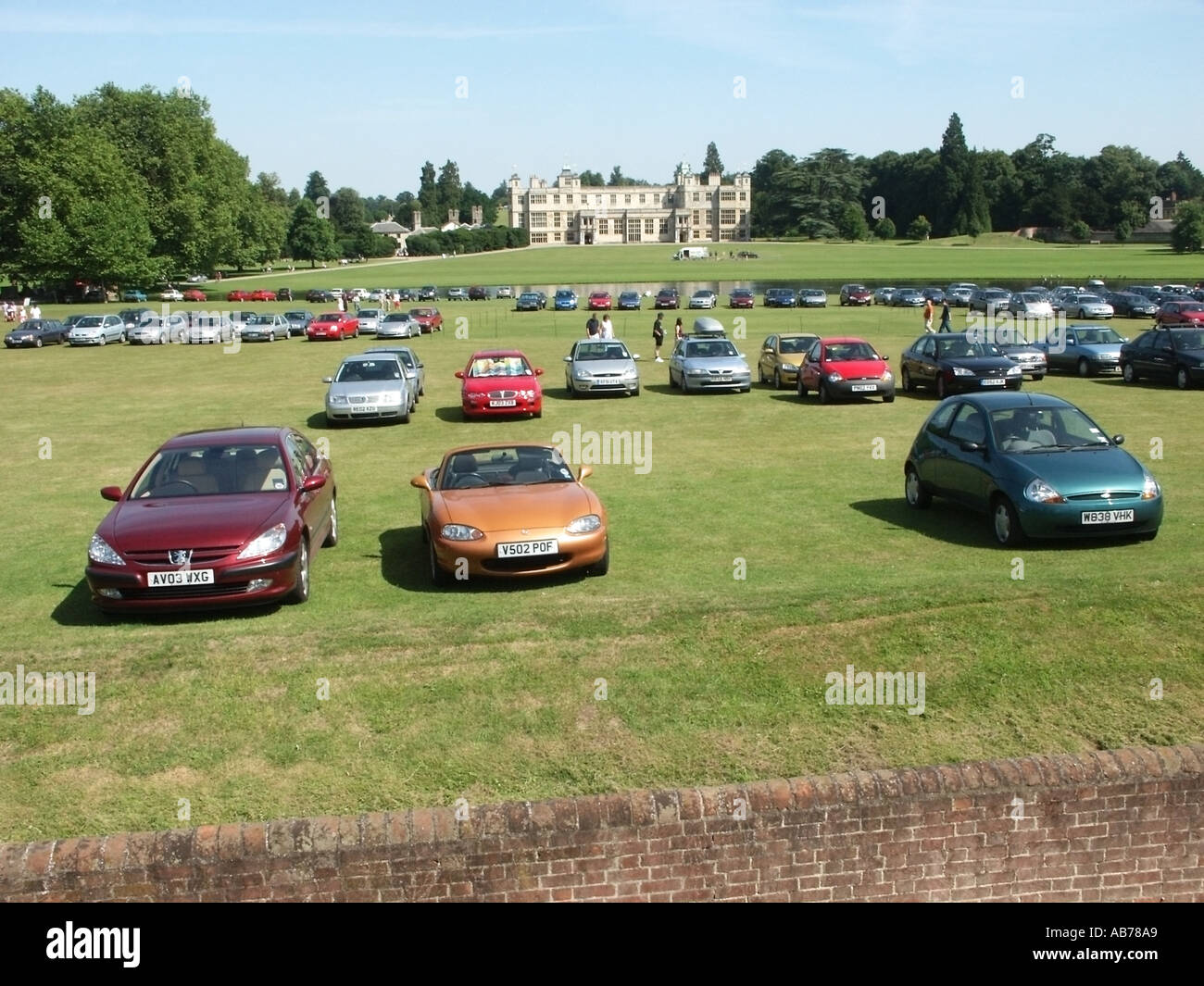 Audley End House near Saffron Walden large Jacobean mansion visitors overflow car park Stock Photo