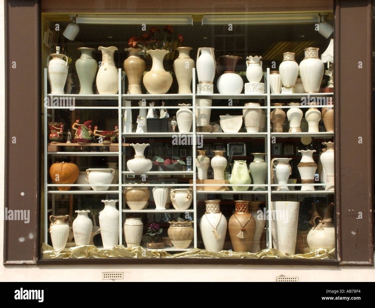 Braintree Essex shop window display of vases ornaments figurines