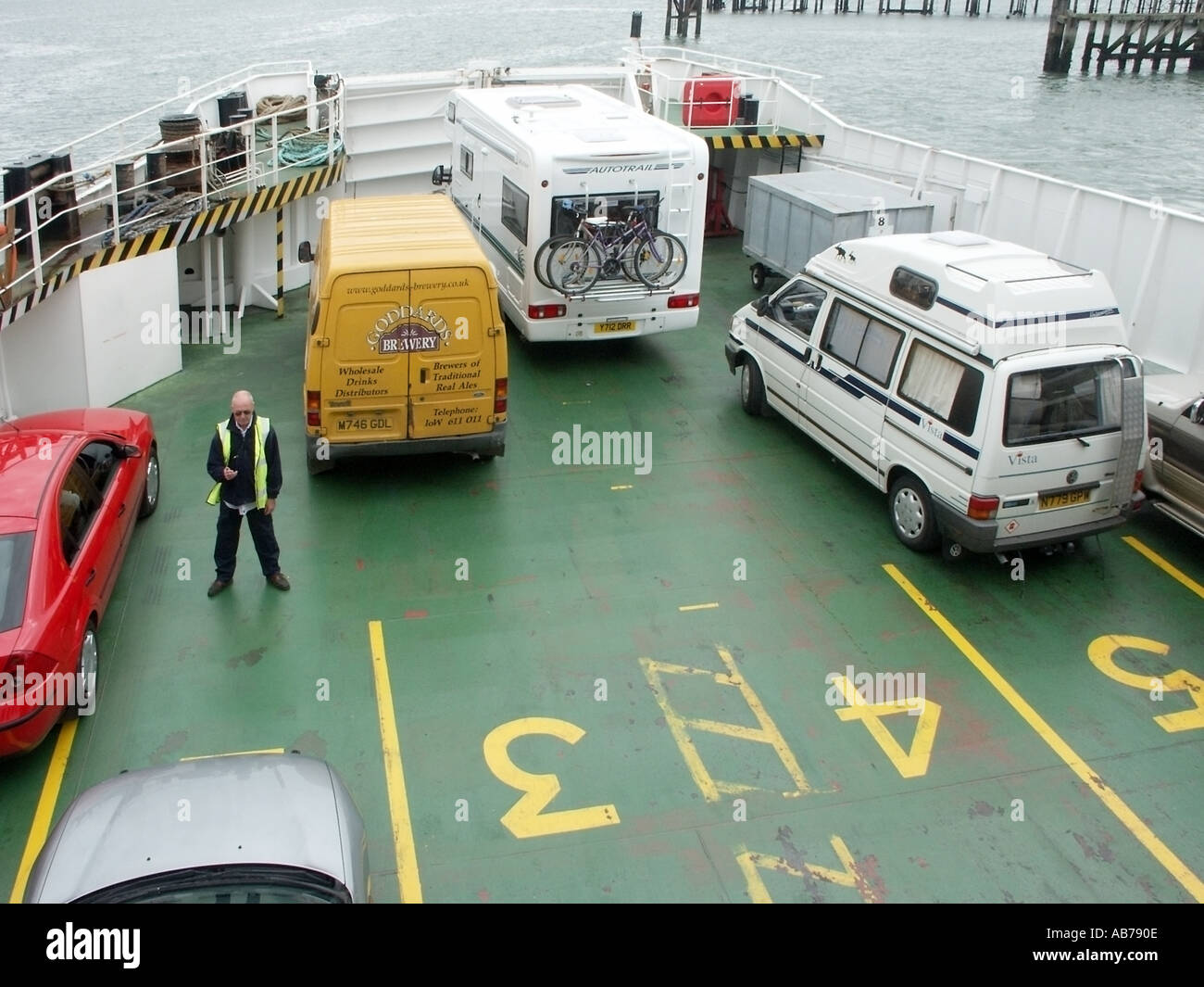 Southampton Hampshire Red Funnel ferry supervised loading of vehicles