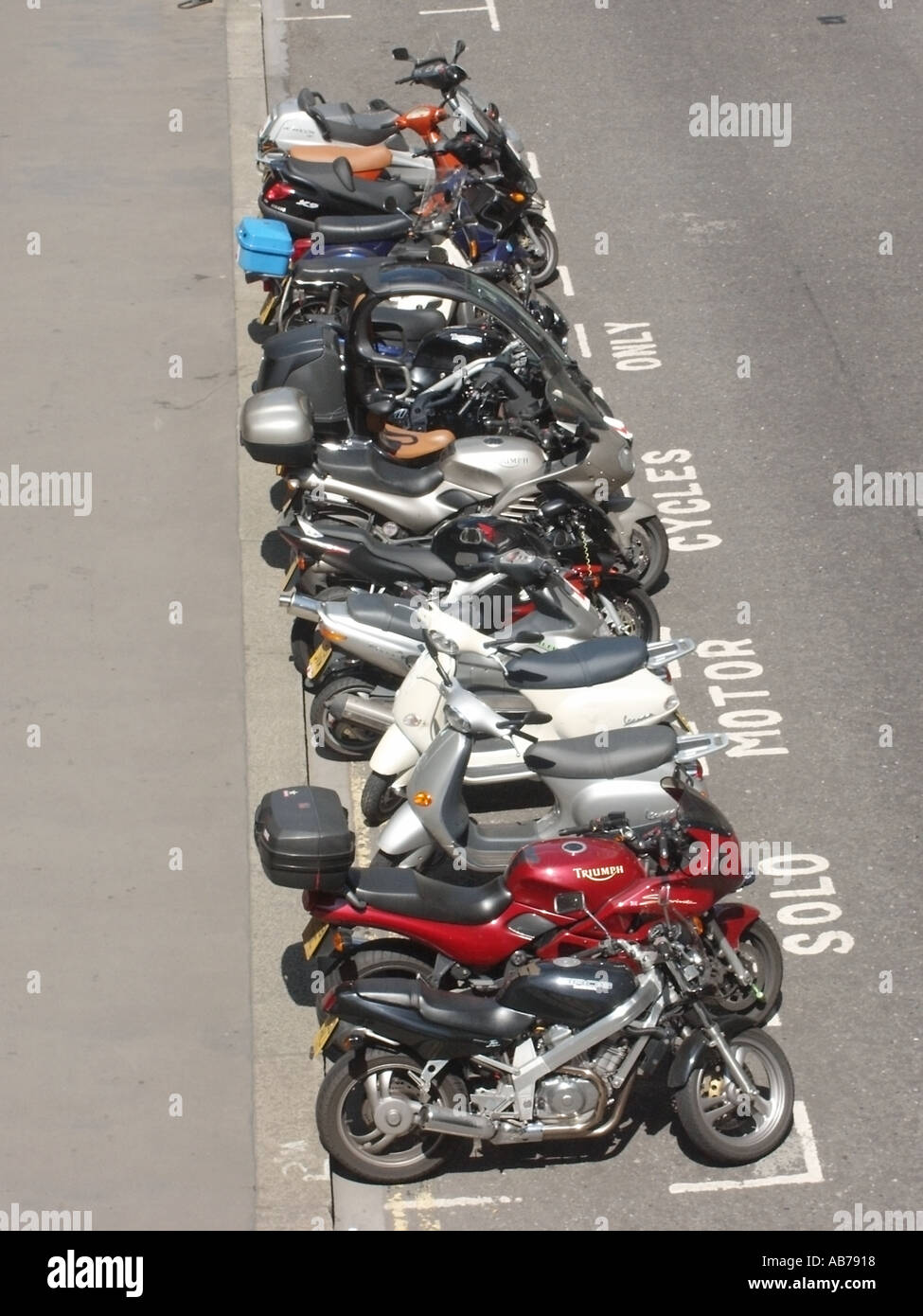 Motorcycles scooter street parking hi-res stock photography and images -  Page 5 - Alamy