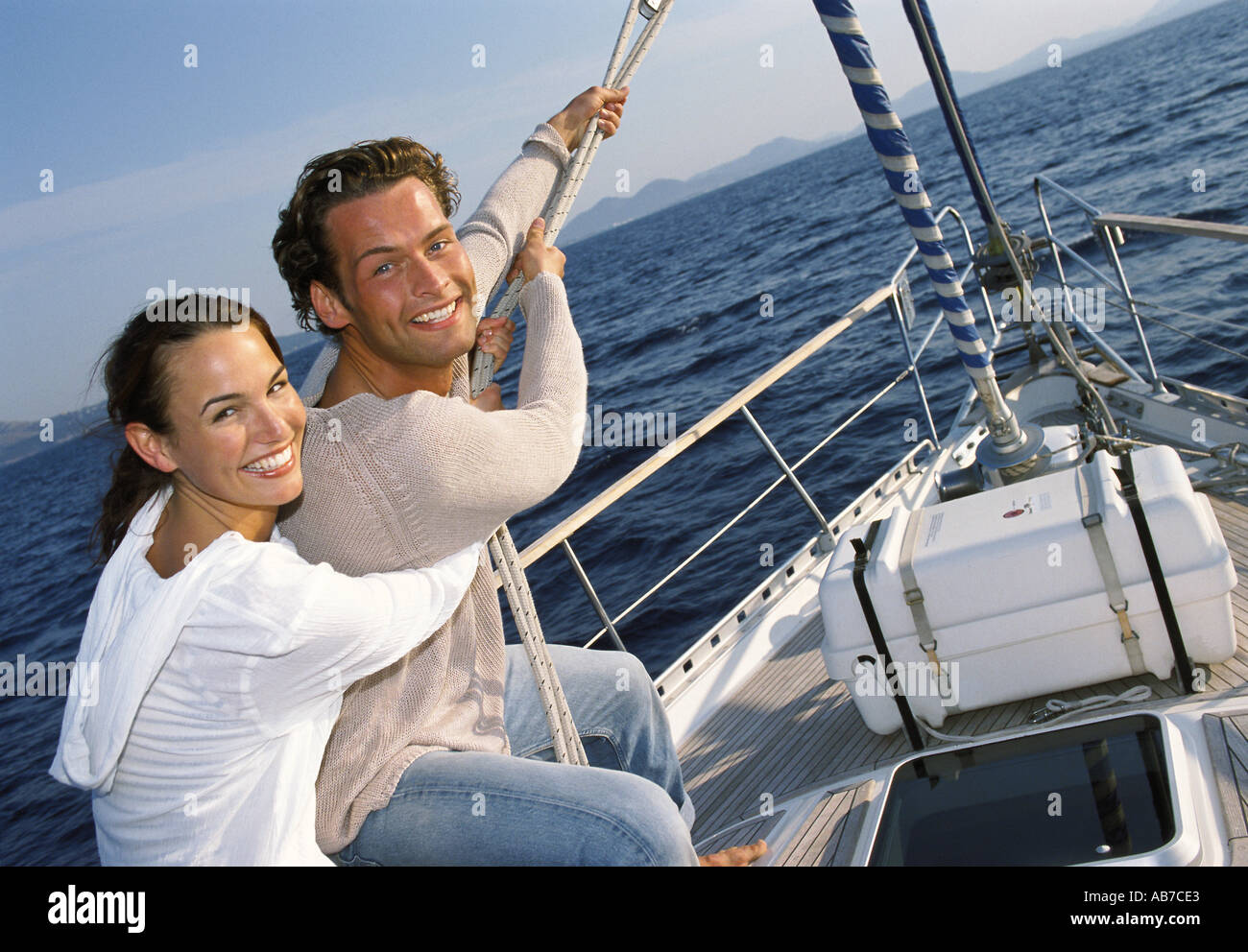 Couple on sailing boat Stock Photo Alamy