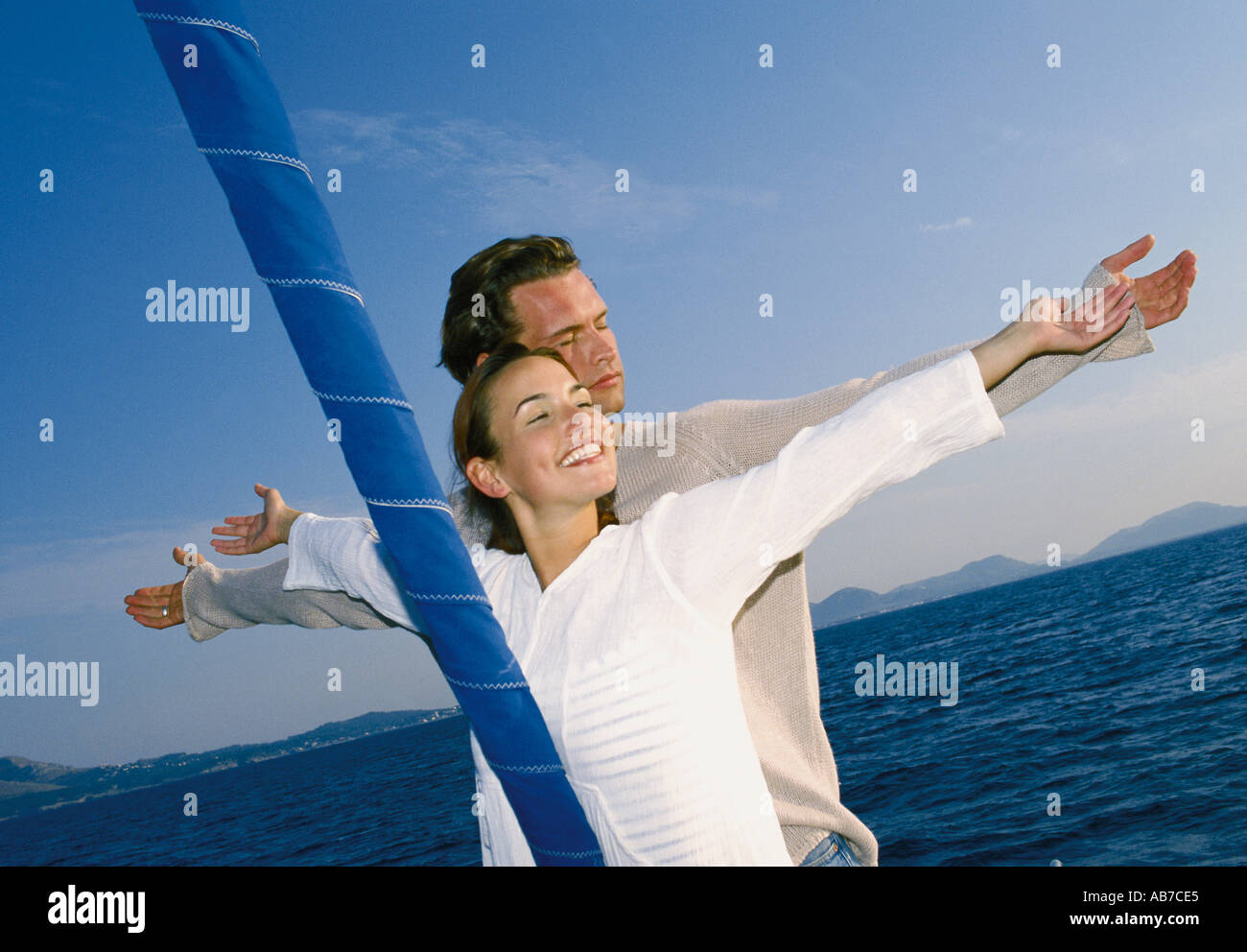 Couple on sailing boat Stock Photo Alamy