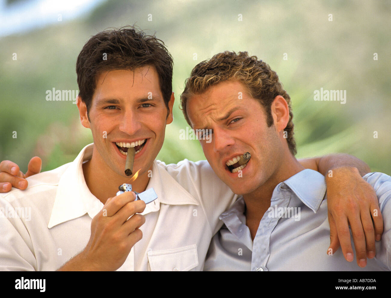 Men smoking cigars Stock Photo