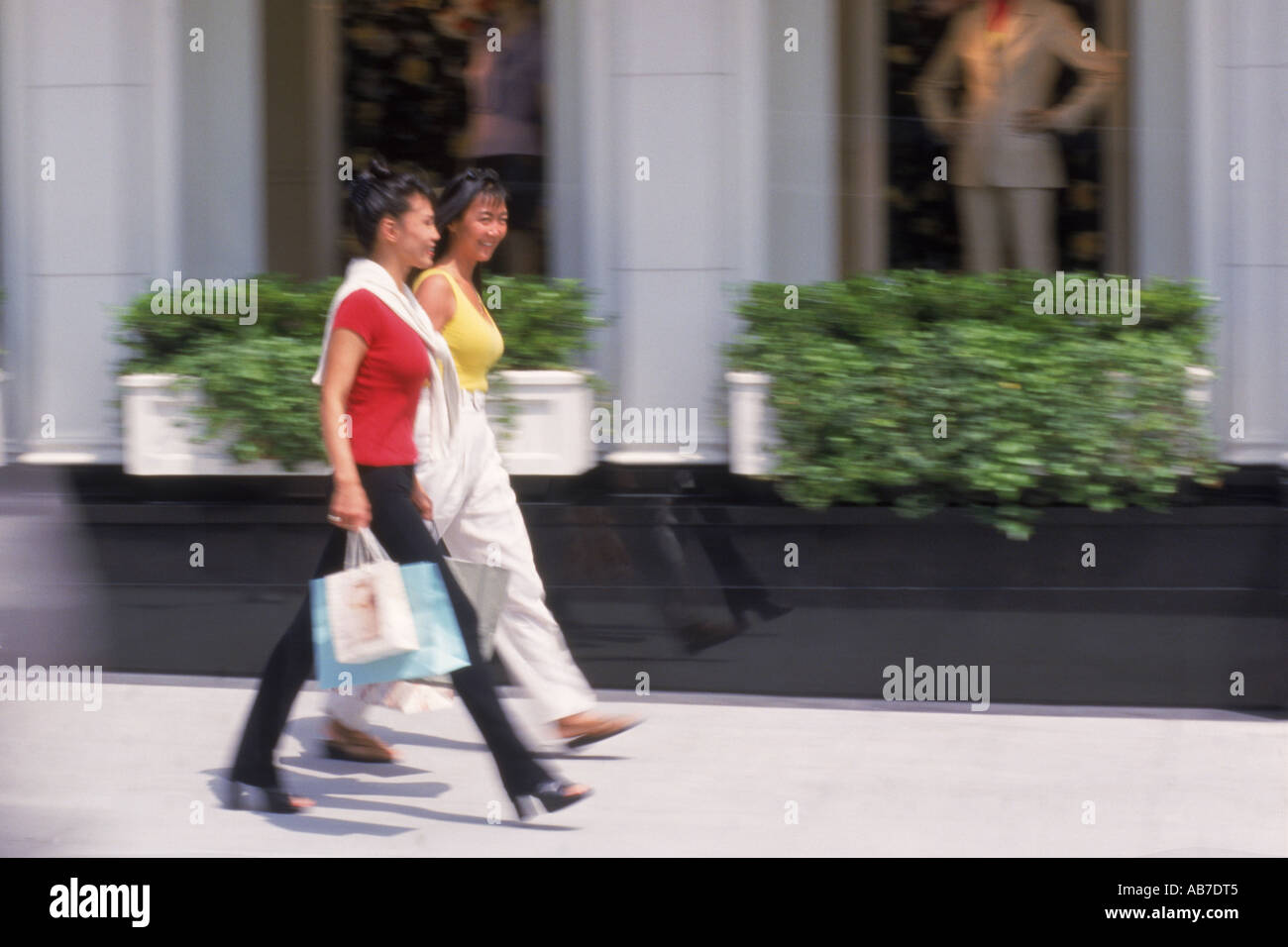 Two women with shopping bags on Rodeo Drive in Beverly Hills California  Stock Photo - Alamy