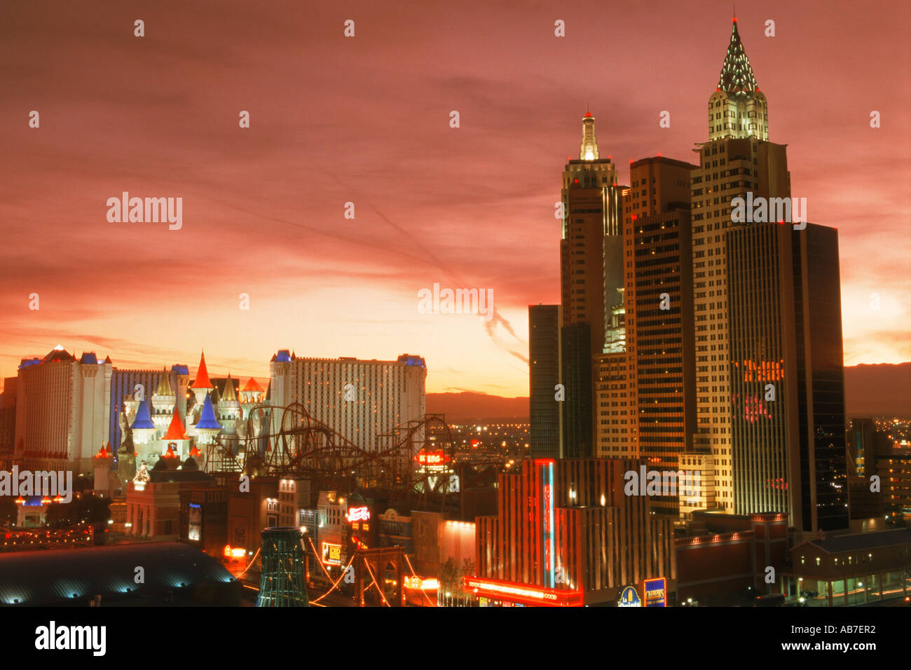 New York New York and Excalibur Hotels on the Strip in Las Vegas at sunset Stock Photo