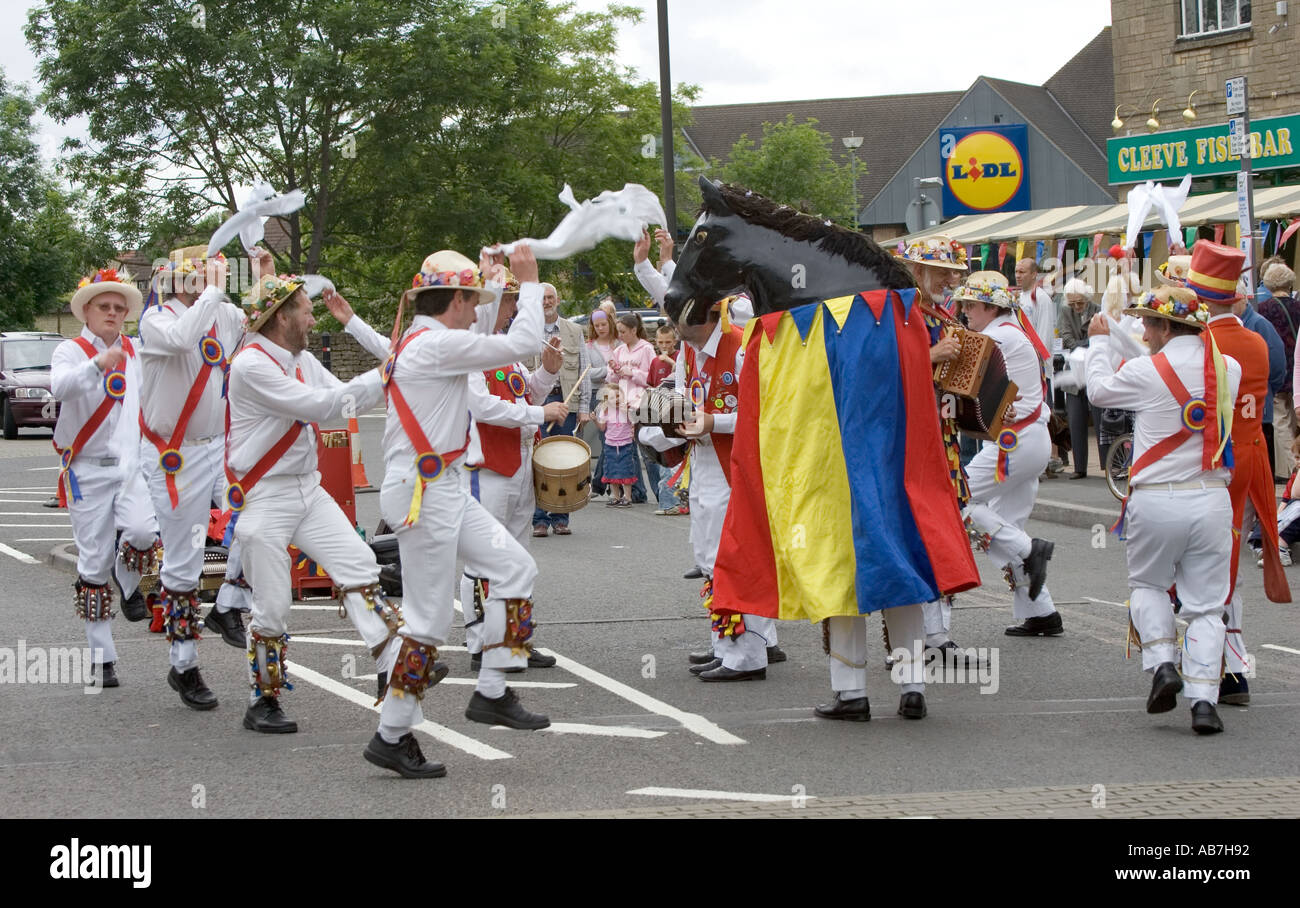 Gloucestershire Morris Men dancing around beast Cleeve Flower