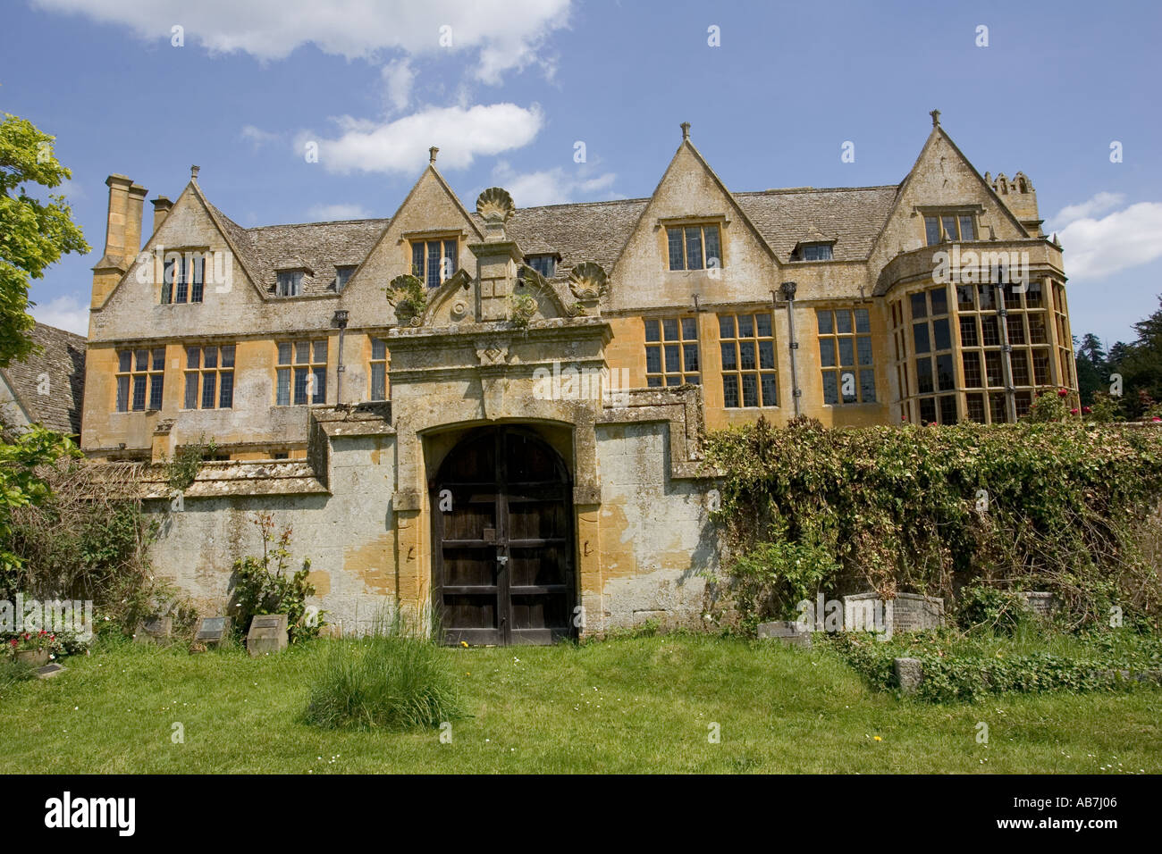Stanway Manor House built in Jacobean period architecture 1630 in Guiting yellow stone Stanton Cotswolds UK Stock Photo