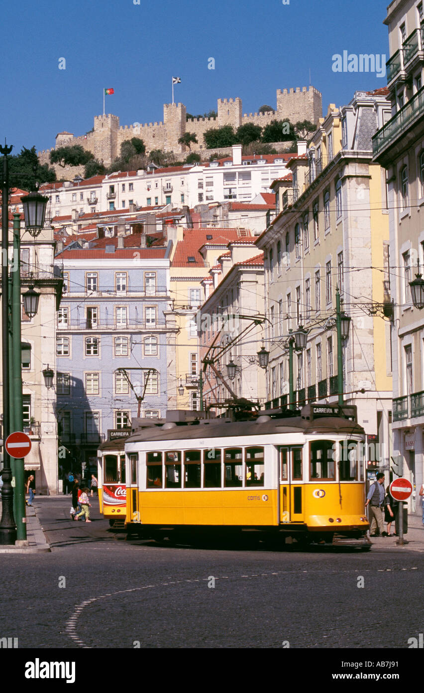 Trams in the street below the Castle of St Jorge City of Lisbon Portugal. To see 60 more images click below thumbnail. Stock Photo