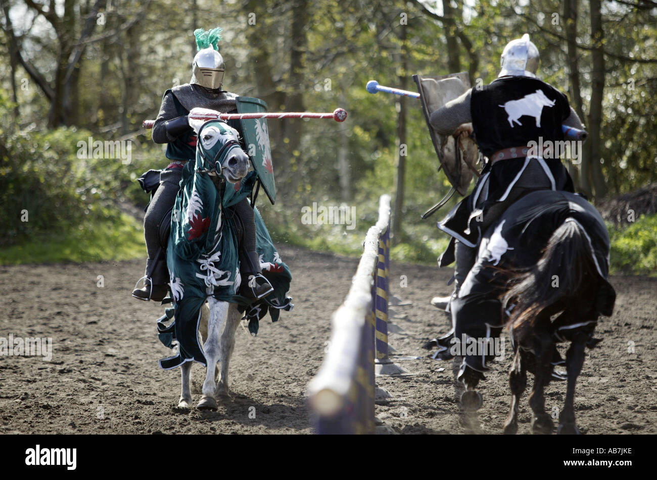 Karl Ude Martinez director of Knights Of Middle England left shows how jousting should be done with colleague Paul Ellis Smith Stock Photo