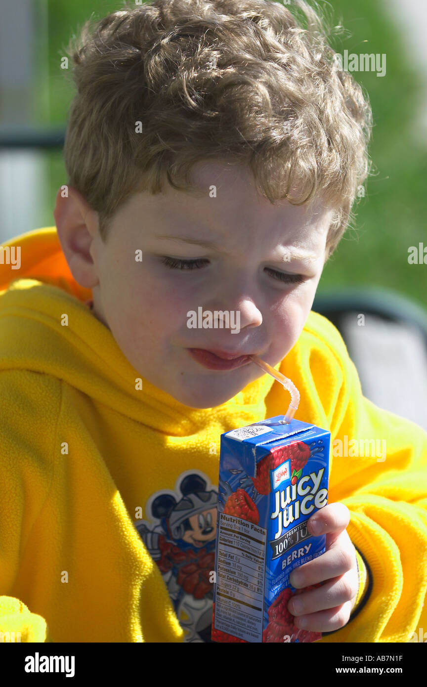 boy drinking juice box Stock Photo Alamy