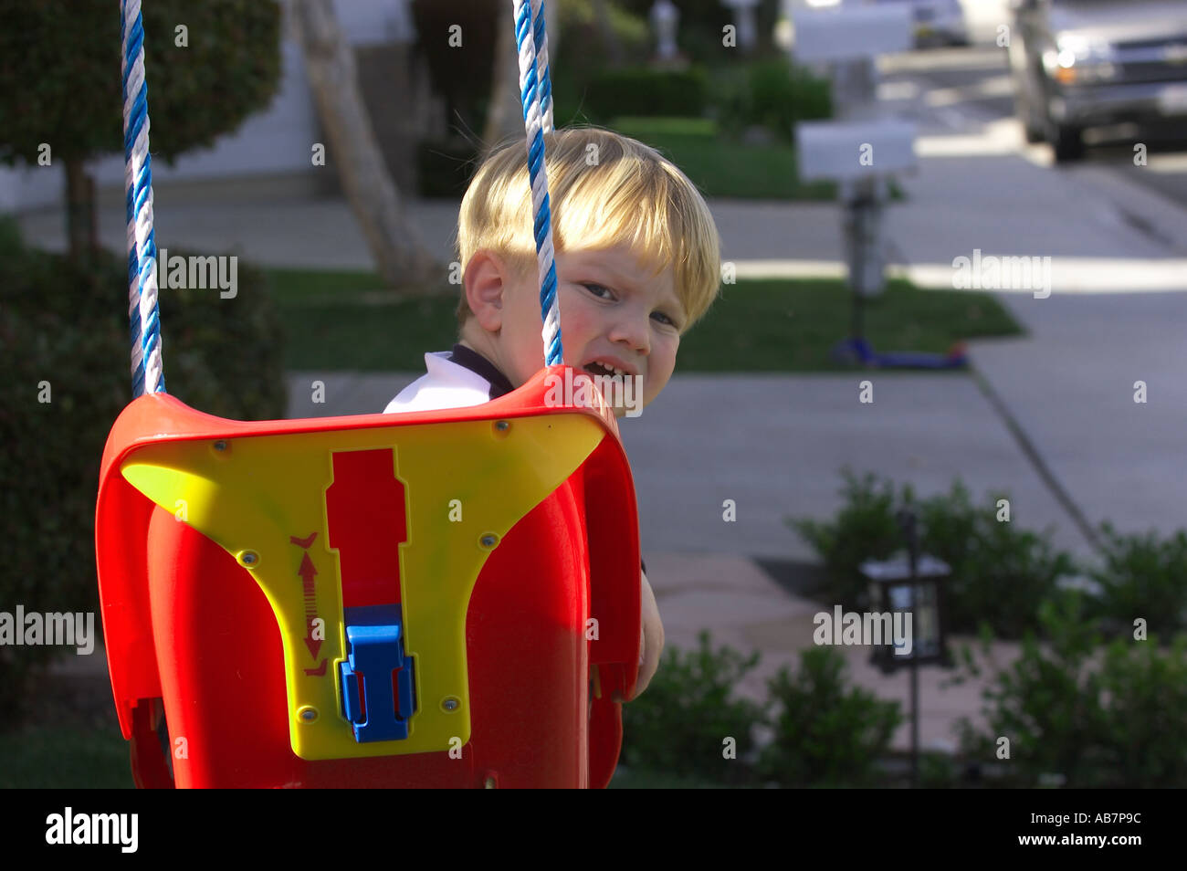 toddler in swing Stock Photo