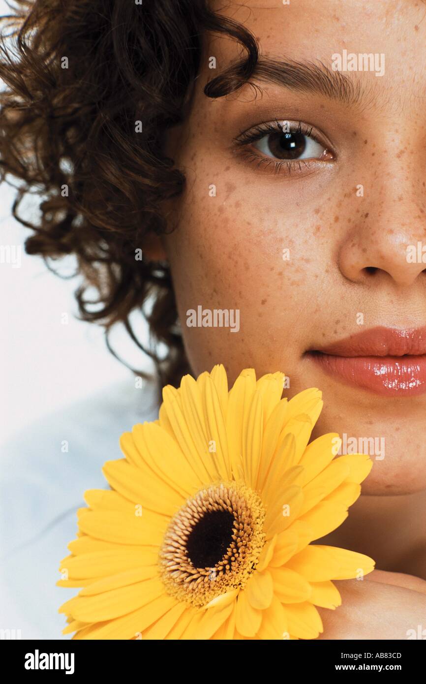 Young woman with flower Stock Photo