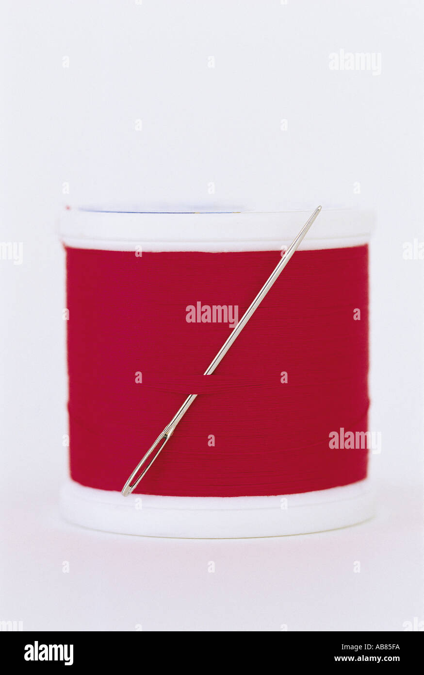 Needle and thread Stock Photo - Alamy