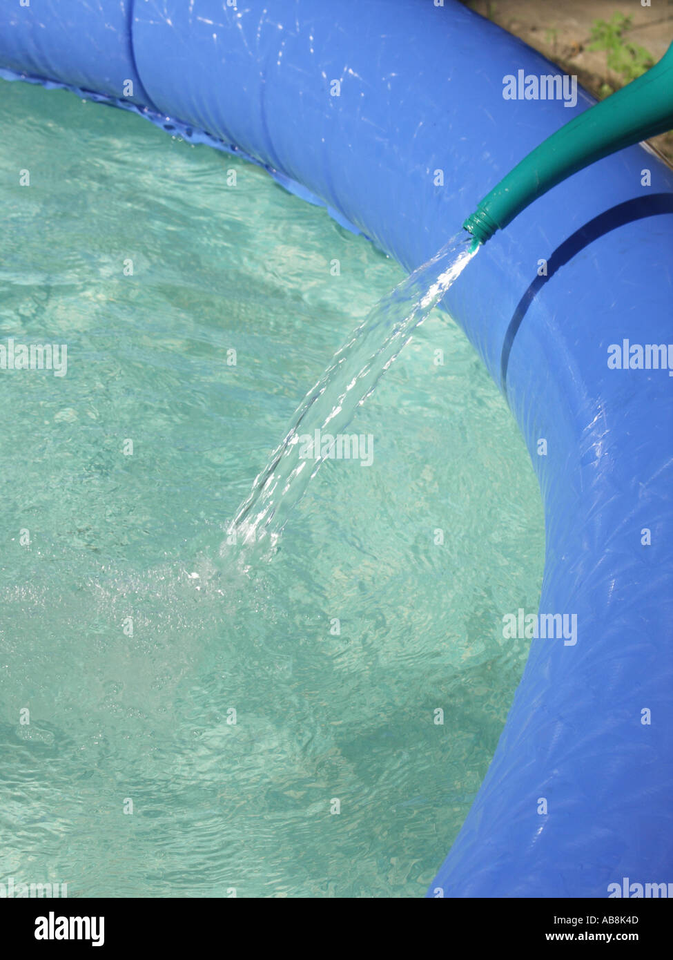 Filling Blowup Pool Stock Photo