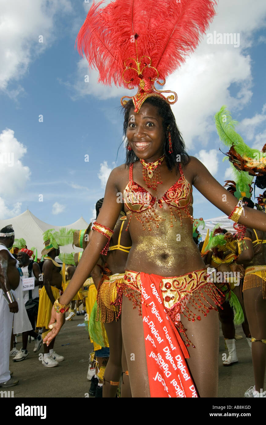 West Indies Trinidad Port of Spain Carnival 2006 Portrait of smiling dancer in colorful costume Parade of Bands Queens Park Stock Photo