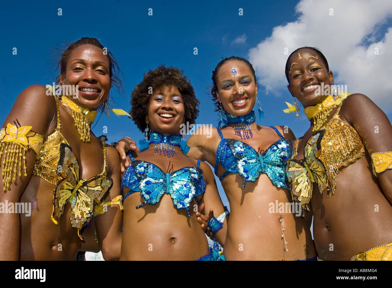 West Indies Port of Spain Trinidad Carnival Close-up of celebrating dancers on mainstage in colorful costumes. Stock Photo