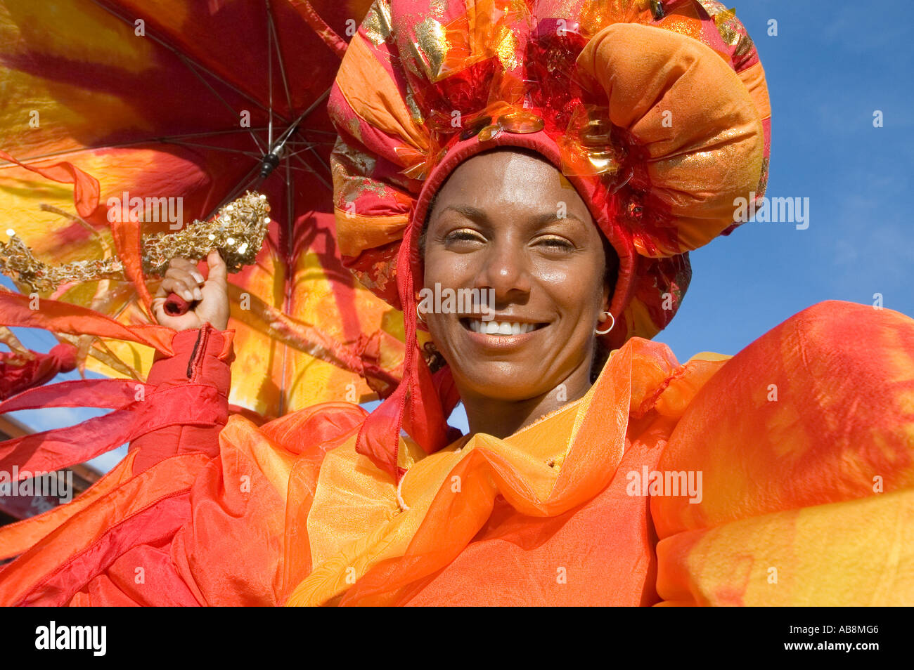 West Indies Port of Spain Trinidad Carnival Portrait of celebrating female dancer on mainstage in colorful costume. Stock Photo
