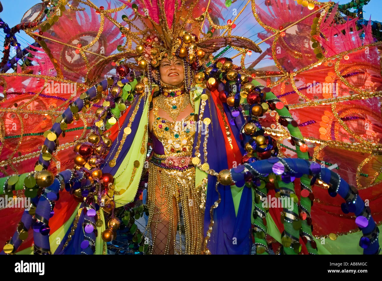 West Indies Port of Spain Trinidad Carnival Portrait of celebrating dancer on mainstage in colorful costume. Stock Photo