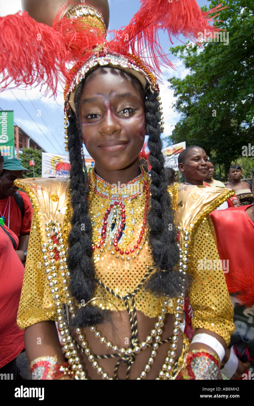 West Indies Port of Spain Trinidad Carnival portrait of Teenage girl in colorful costume at Kids Carnival parade Stock Photo