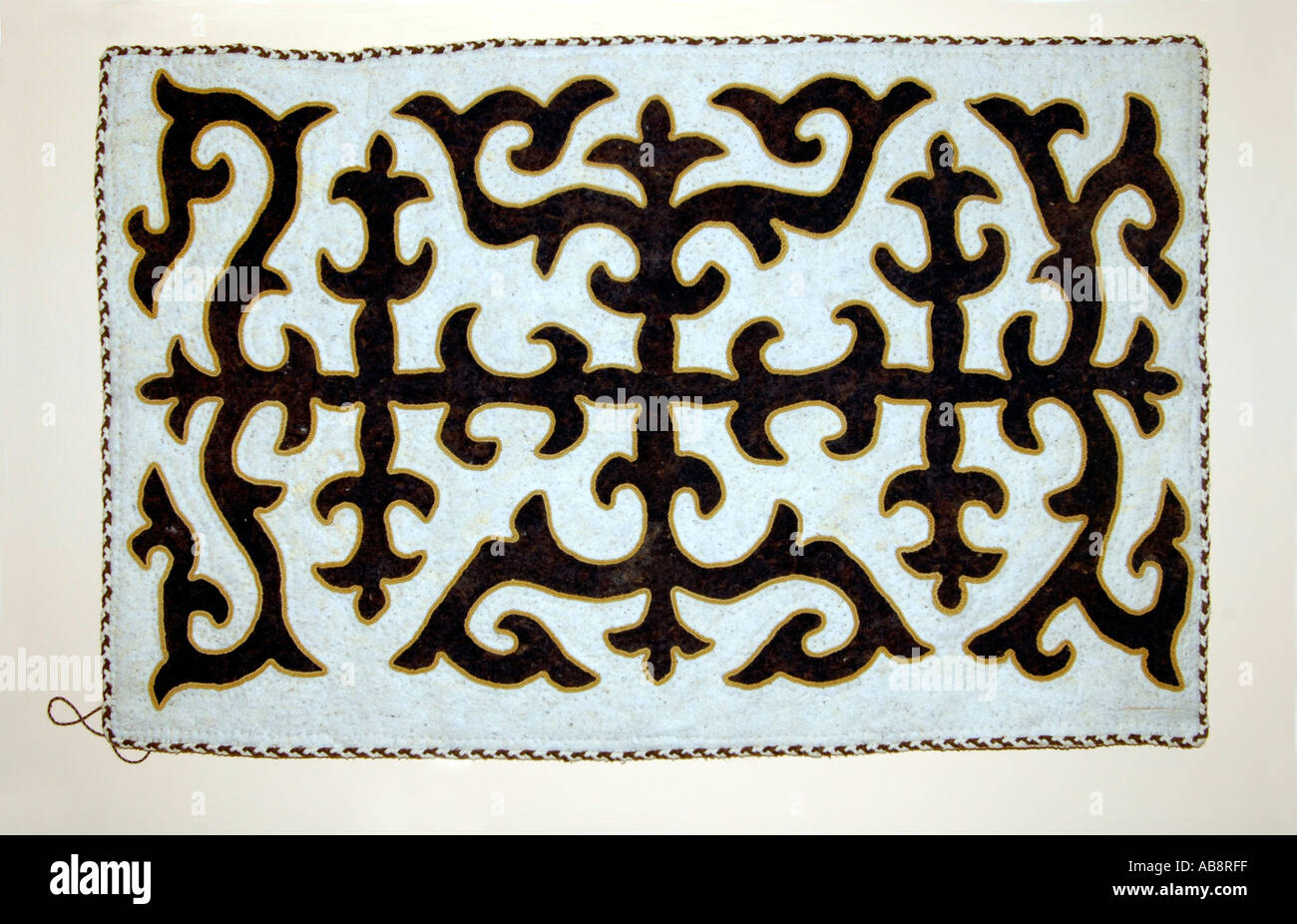 A type of felt carpet or wall hanging known as a Syrmak associated with the nomadic peoples of Central Asia, including the Kyrgyz and Kazakhs Stock Photo