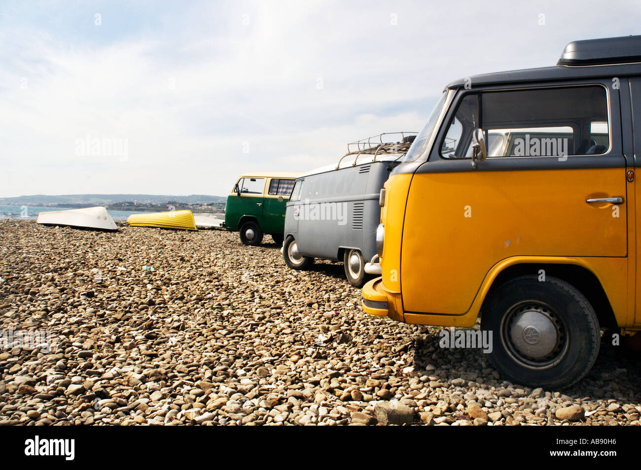 Yellow Volkswagen camper van parked on the sea front santa marinella ...