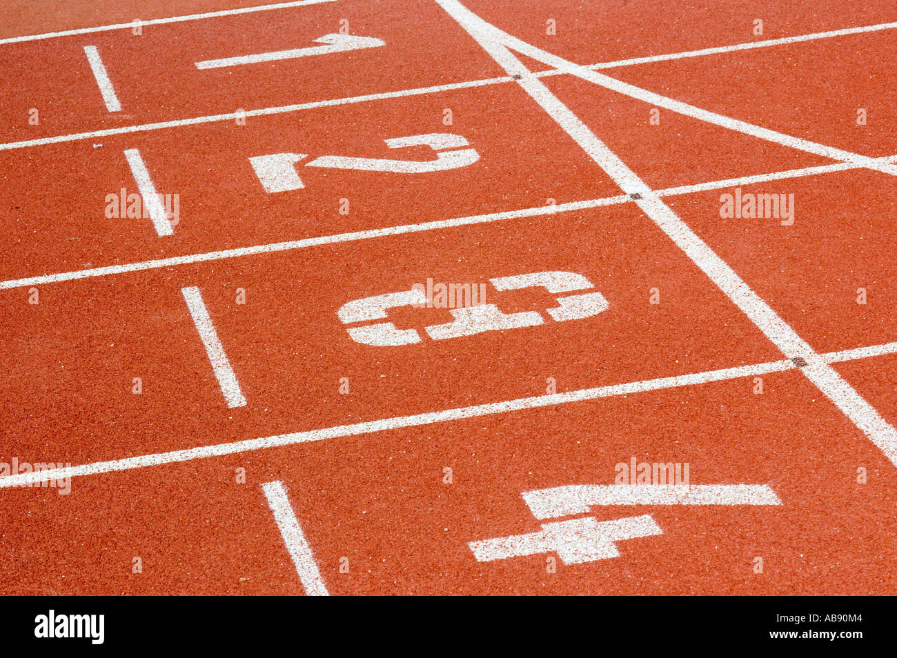 Close up of start line on running track Stock Photo