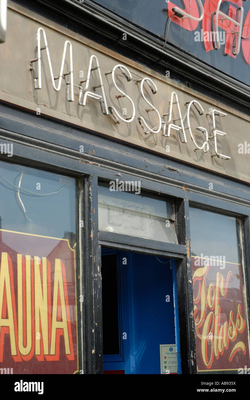 Close up of seedy massage parlour shop front Stock Photo Alamy