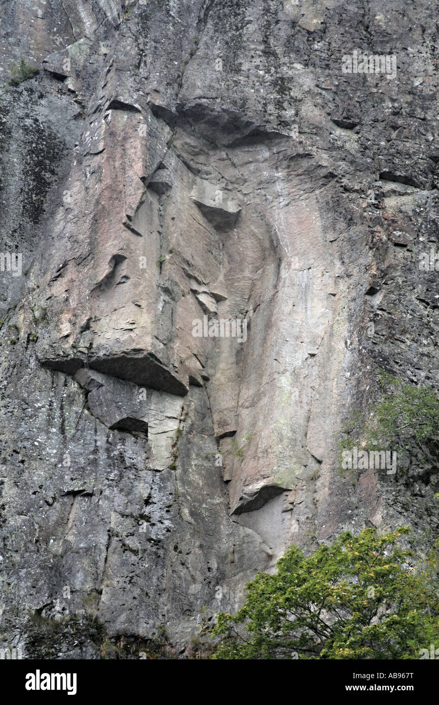 structure resembling a face on a rock, not man-made Stock Photo