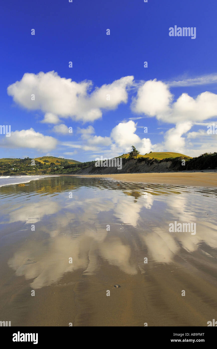 clouds mirroring on sandy beach, New Zealand, Otago, Pazifik, Moeraki Stock Photo