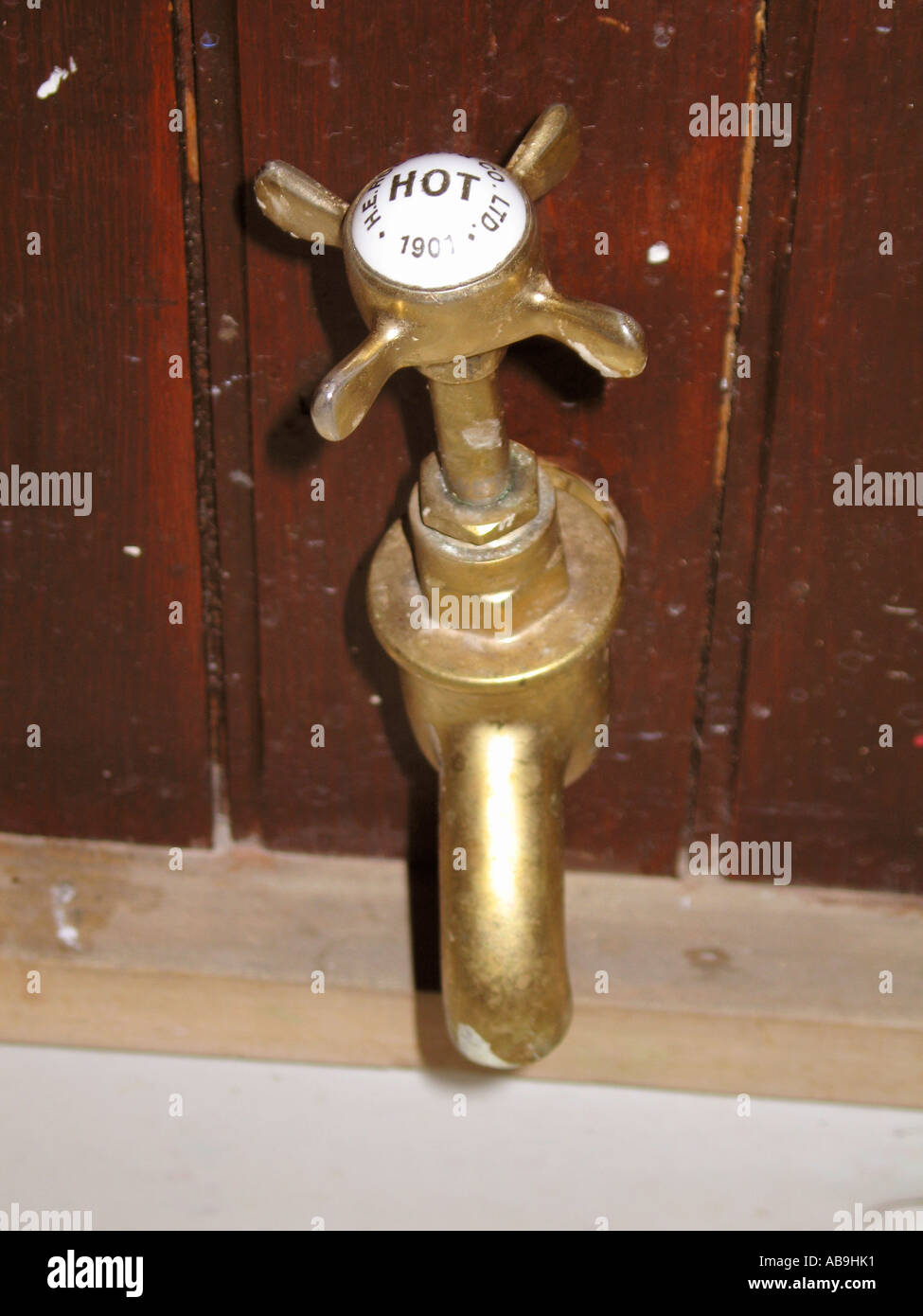 Old fashioned brass hot water tap Stock Photo Alamy
