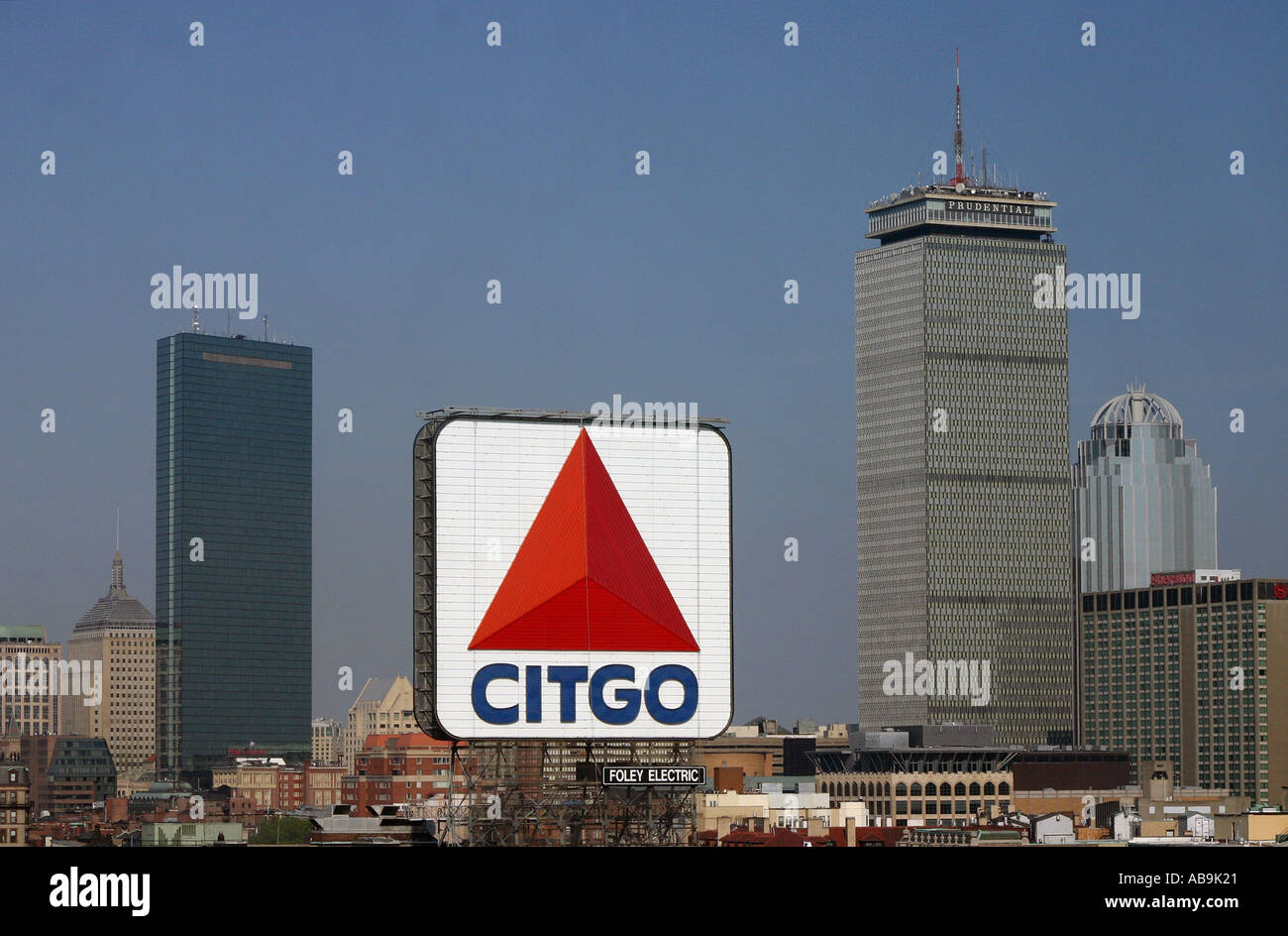 The historic CITGO sign located in Kenmore Square in Boston down the street from Fenway Park Boston skyline is visable Stock Photo